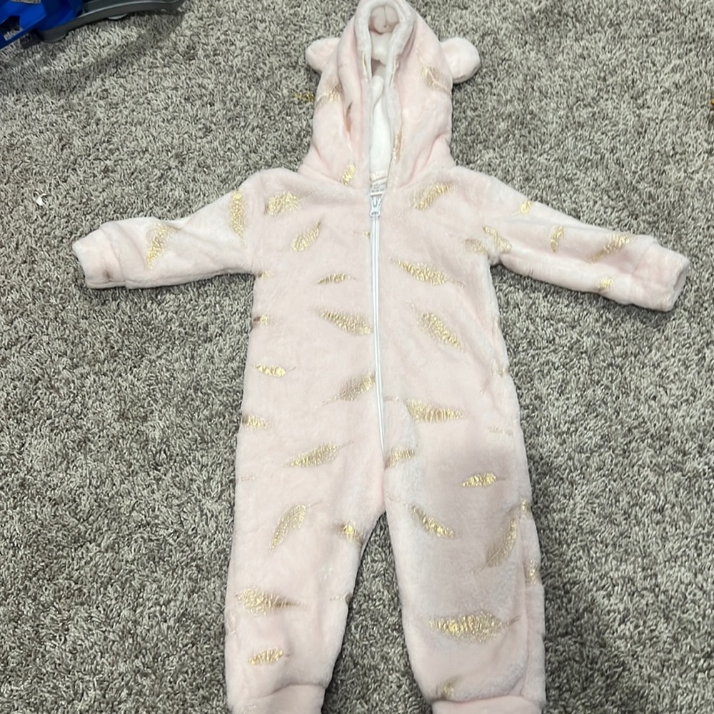 Warm sleeper. Pink with gold feathers